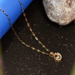 AuraSpark Gold Dancing Swan Necklace with Floating Crystal