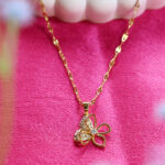 AuraSpark Gold Butterfly Flower Necklace with Sparkly Stones