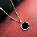 Men’s silver box chain with black circular pendant