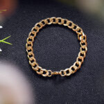 High-polish gold curb chain wristband with lobster clasp