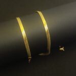 Close-up of 18k Gold Flat Herringbone Chain for women