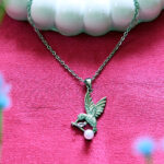 AuraSpark Silver Hummingbird Necklace with Pink Stone and Pearl.