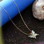 AuraSpark Blue Butterfly and Gold Flower Pendant Necklace