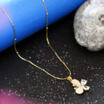 Elegant butterfly jewelry with peach moonstone and zirconia