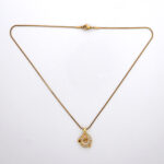 Dainty Gold Circle Necklace with Floating Butterfly Charm.