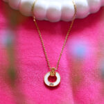 AuraSpark Gold Circle Amulet Necklace with Central Diamond