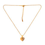 Close-up of half-polished half-crystal heart jewelry piece