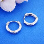 Textured silver huggie hoop earrings