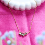 AuraSpark 18K Gold Trillion Cut Triple Stone Necklace for Women.