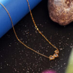 Minimalist Three Stone Triangle Bezel Set Pendant in Gold