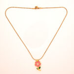 Delicate floral jewelry for women featuring a blush pink blossom
