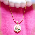 AuraSpark Pink Enamel Floral Pendant on Gold Snake Chain.