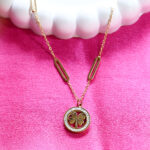 Gold clover necklace with crystal halo on paperclip chain