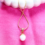 AuraSpark gold snake chain necklace with white pearl globe