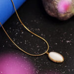 AuraSpark Gold Oval Pendant Necklace with Cat's Eye Stone