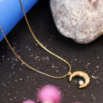 AuraSpark 18K gold crescent moon necklace with crystal