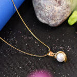 AuraSpark gold plated pearl moon pendant on snake chain