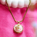 AuraSpark Gold Starfish Pendant with Pink Enamel and Pearl