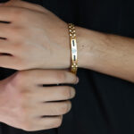 AuraSpark Gold Om Bracelet for Men with Black Line Detail.