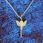 AuraSpark Silver Winged Blade Pendant Necklace for Men
