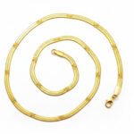 Flat snake gold necklace with embossed star detail design