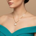 Close-up of Pink and Gold Starfish Jewelry on Snake Chain