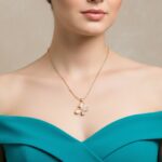 AuraSpark peach and crystal butterfly pendant on gold chain