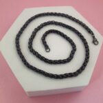 Close-up of AuraSpark Black Braided Wheat Necklace for Men